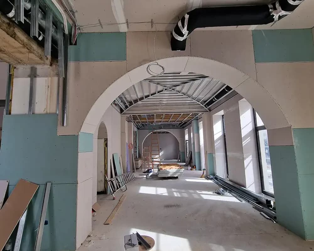 Arched opening formed with plasterboard during installation